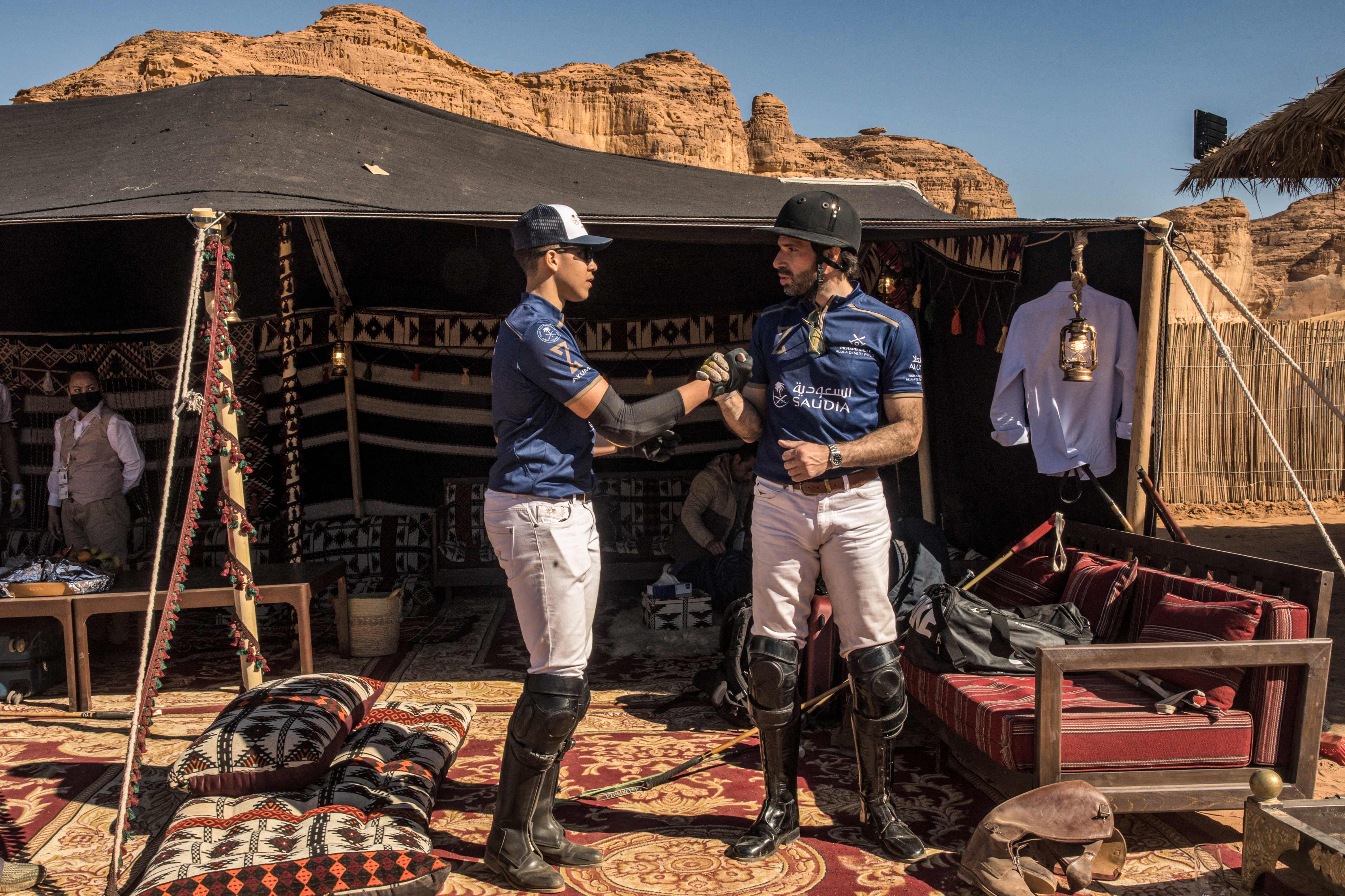A team talk for Prince Salman Bin Mansour, left, and Hosam Zawawi.