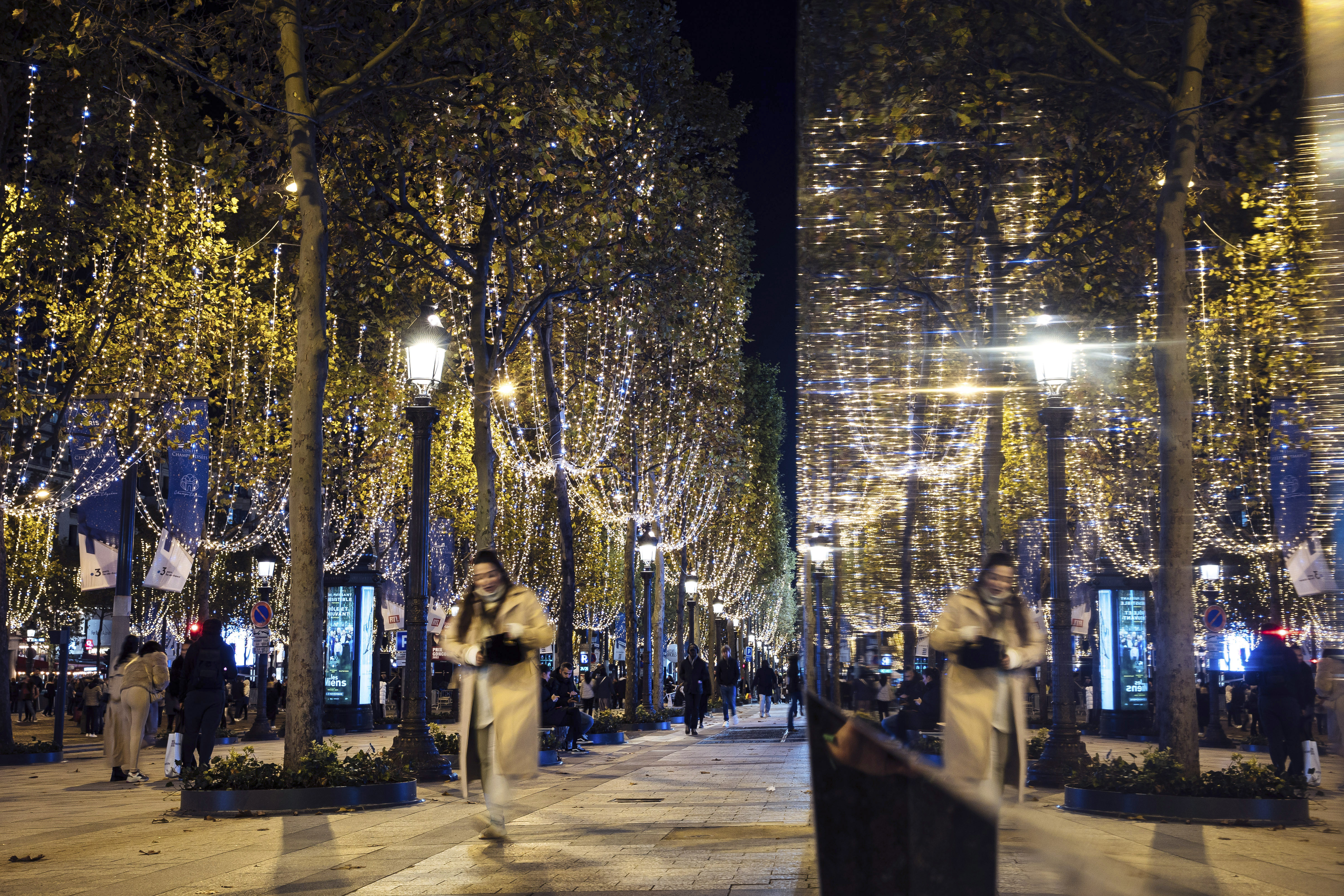 Paris's Champs-Élysées switches on its Christmas lights