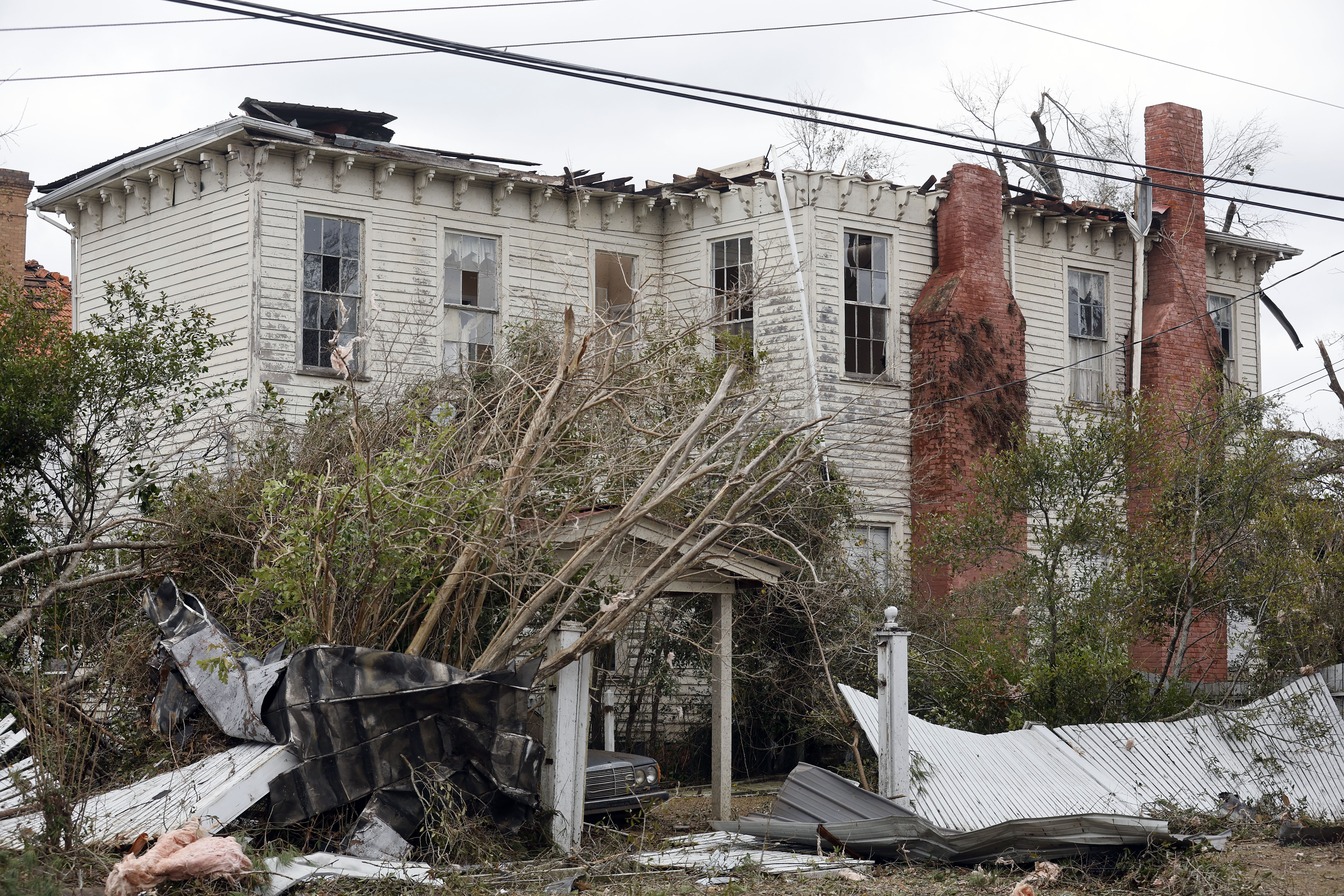 Rescuers raced to find survivors on Friday in the aftermath of a tornado-spawning storm system that barreled across parts of Georgia and Alabama. AP