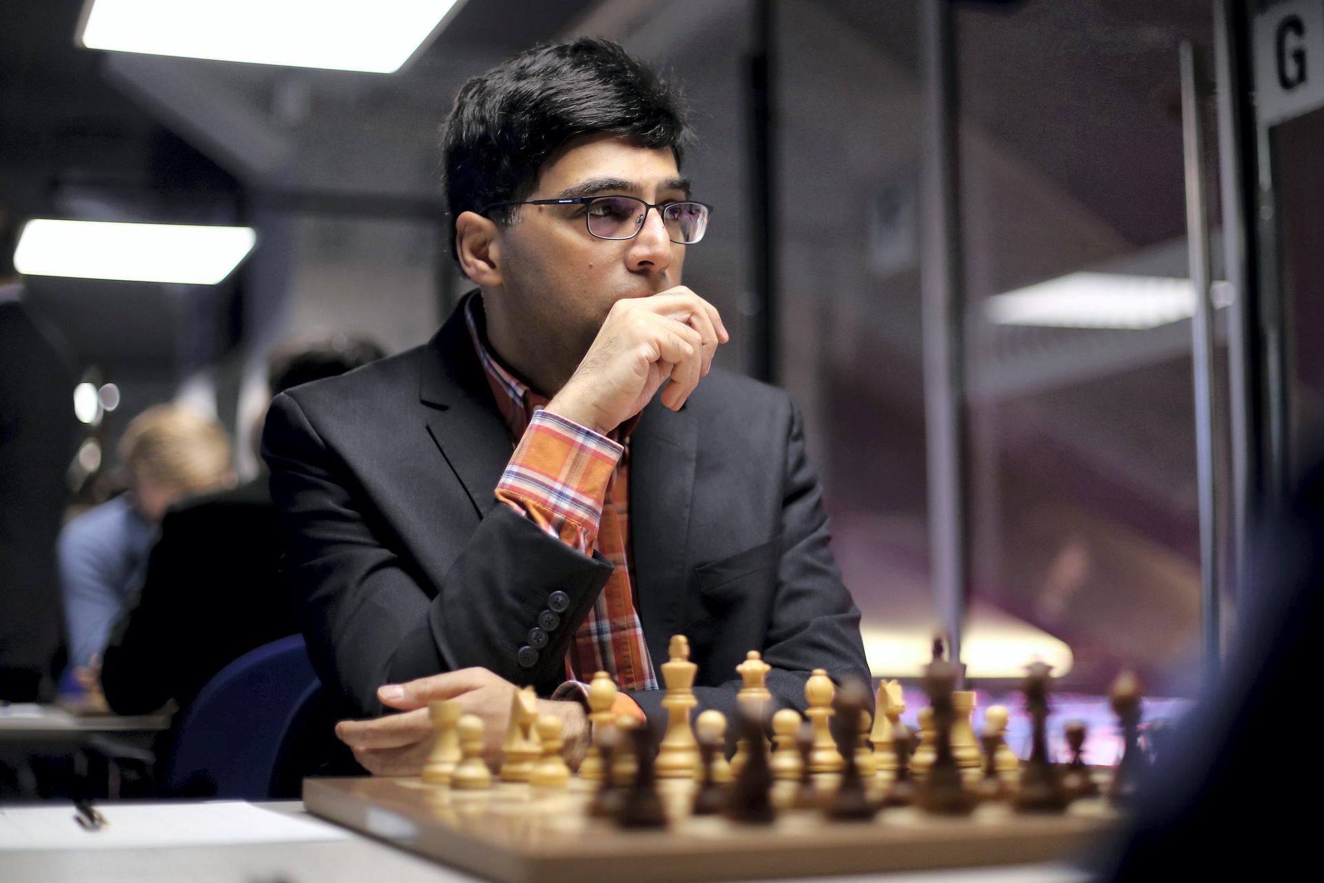 Defending World champion Viswanathan Anand, from India, contemplates his  next move during the eighth game of the Chess World Championship between  him and Russia's Vladimir Kramnik in the Art and Exhibition Hall