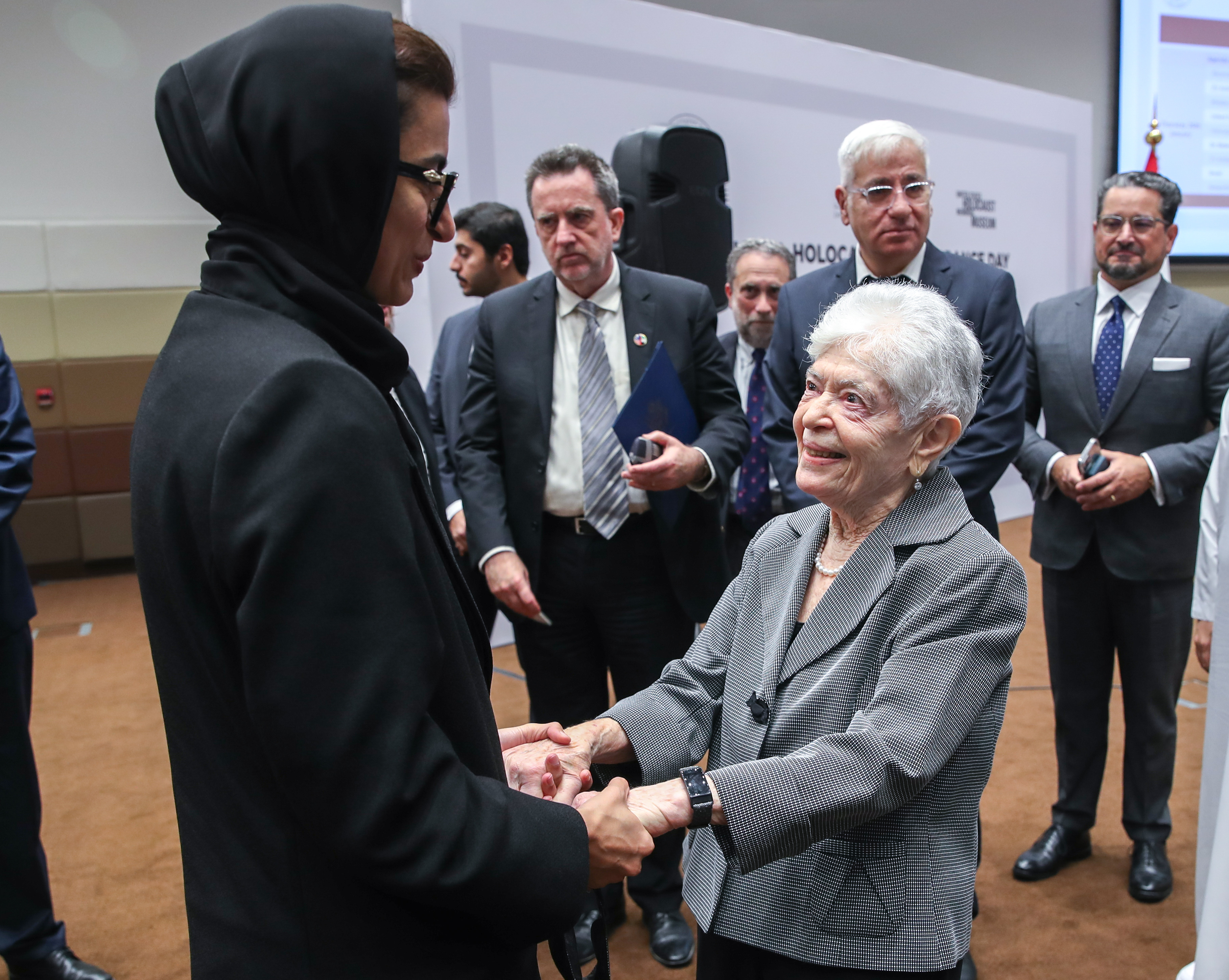 Noura Al Kaabi, Minister of Culture and Youth, and president of Zayed University, greets Ruth Cohen. Victor Besa / The National