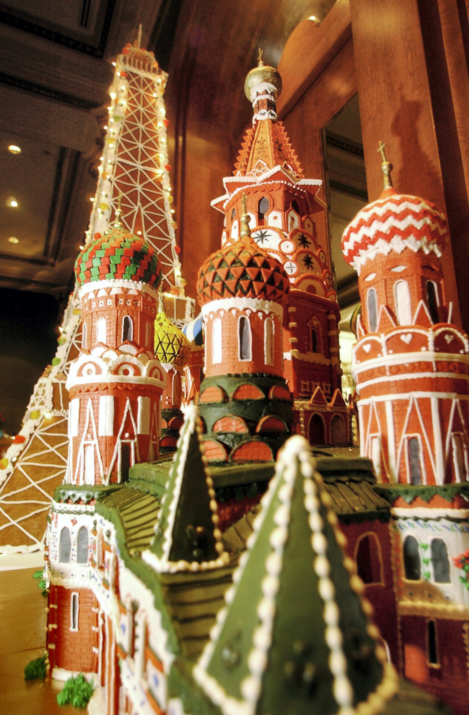 A gingerbread replica of St Basil's Cathedral in Russia, with a replica of the Eiffel Tower in the background, is displayed in the lobby of the US Grant Hotel in December 2002 in San Diego, California. Getty Images