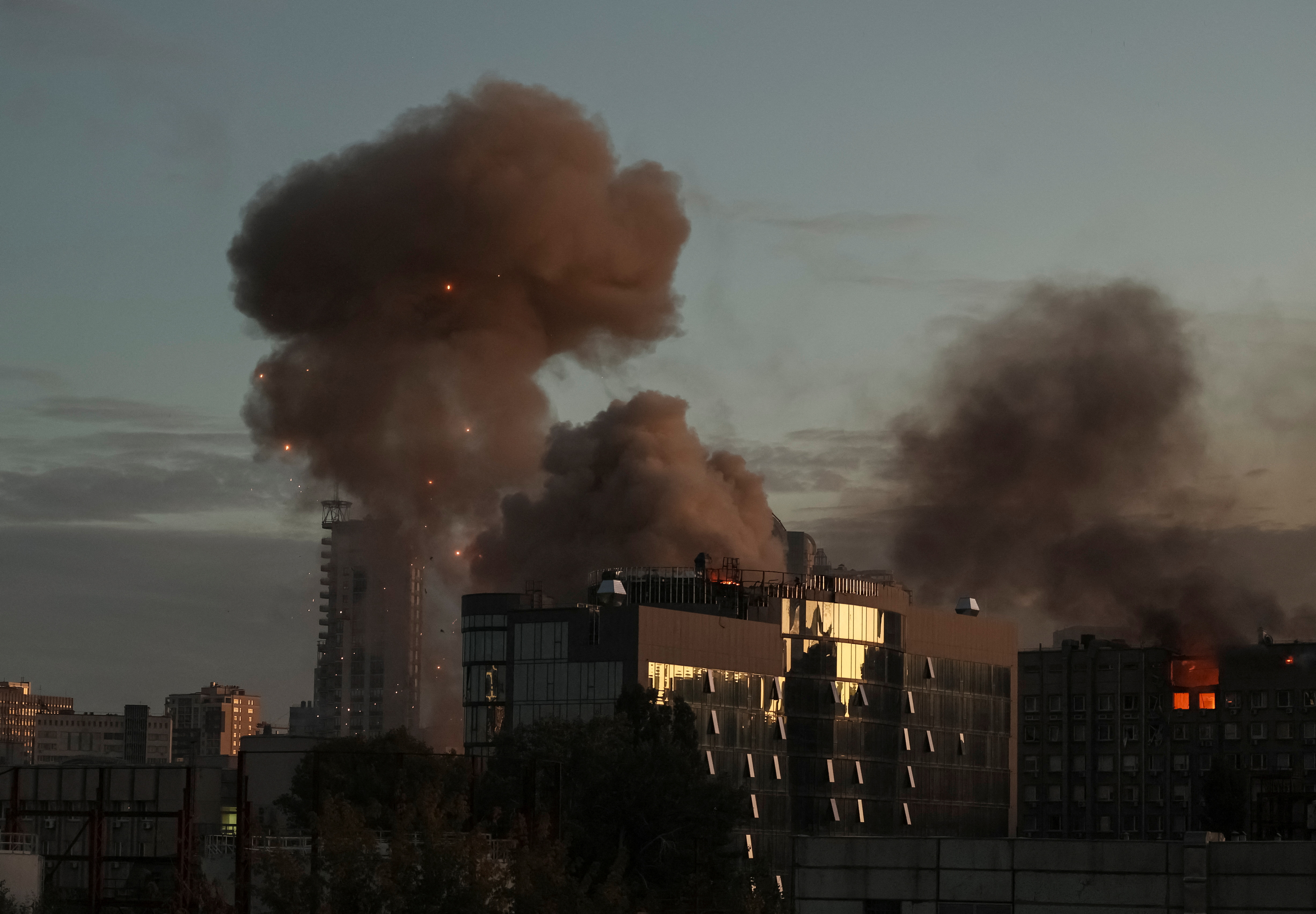 Plumes of smoke rise after a Russian drone strike. Reuters