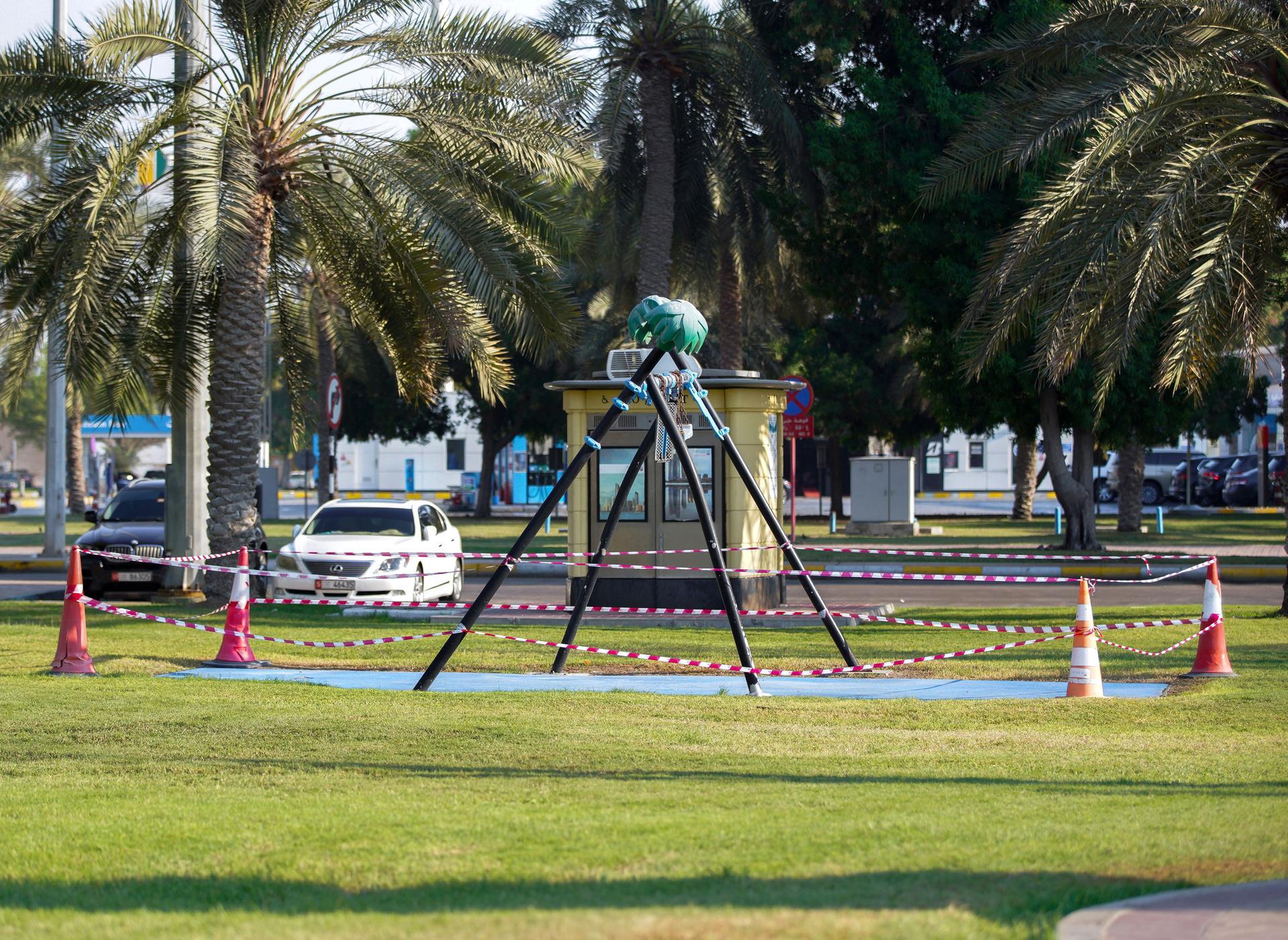 A swing is cordoned off along the Corniche in Abu Dhabi, as part of Covid-19 precautionary measures. Victor Besa / The National