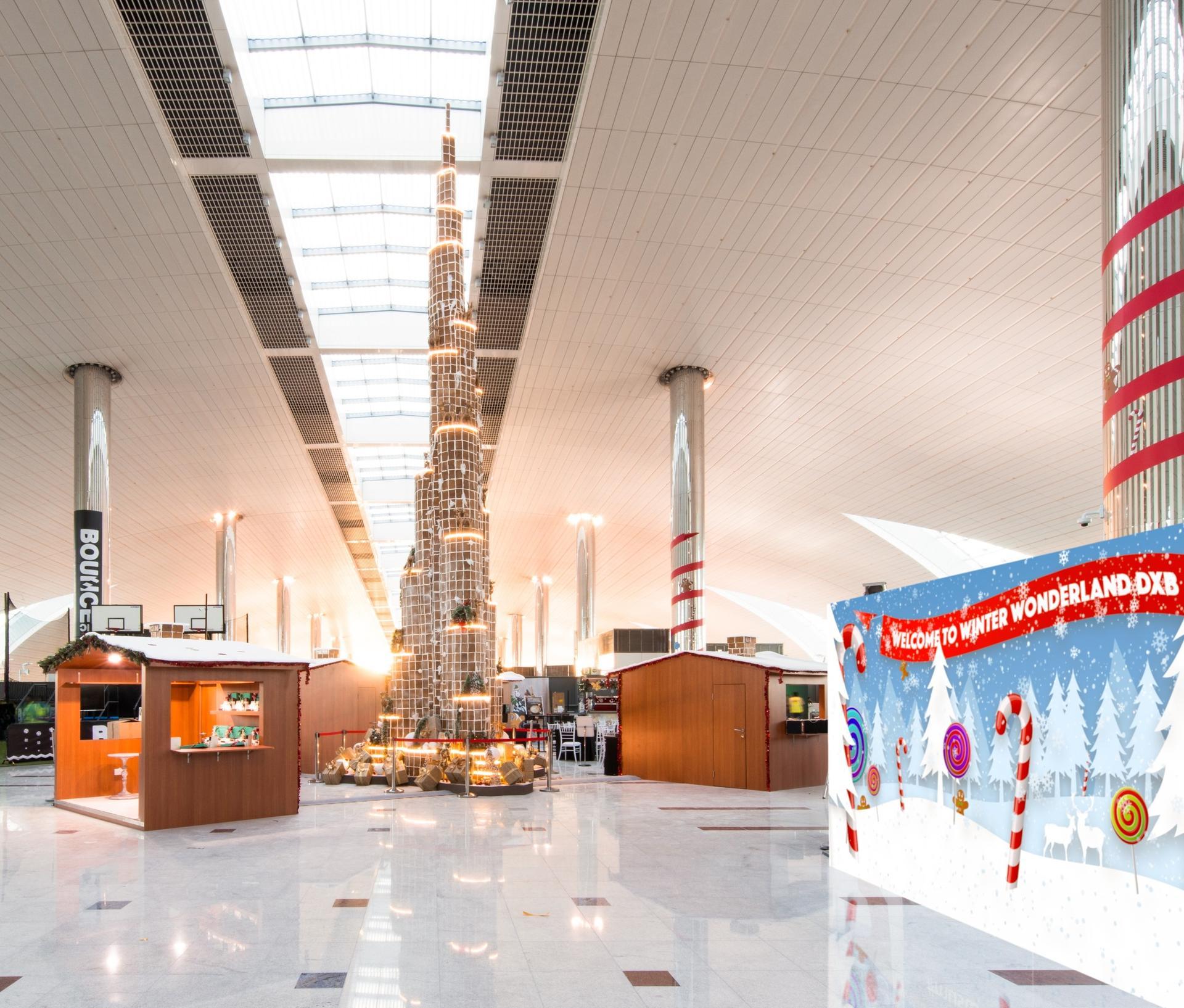 A gingerbread Burj Khalifa awaits visitors in Dubai International Airport's Terminal 3 in December 2017. Courtesy Address Dubai Marina