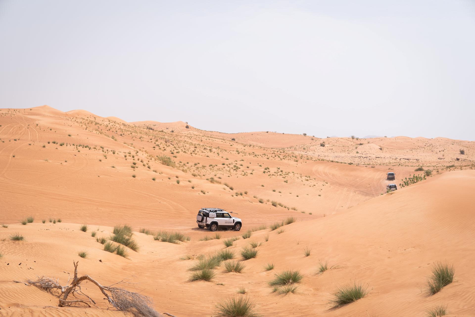 Review: We Tackled the Dunes of Dubai in the Land Rover Defender 130 – Robb  Report