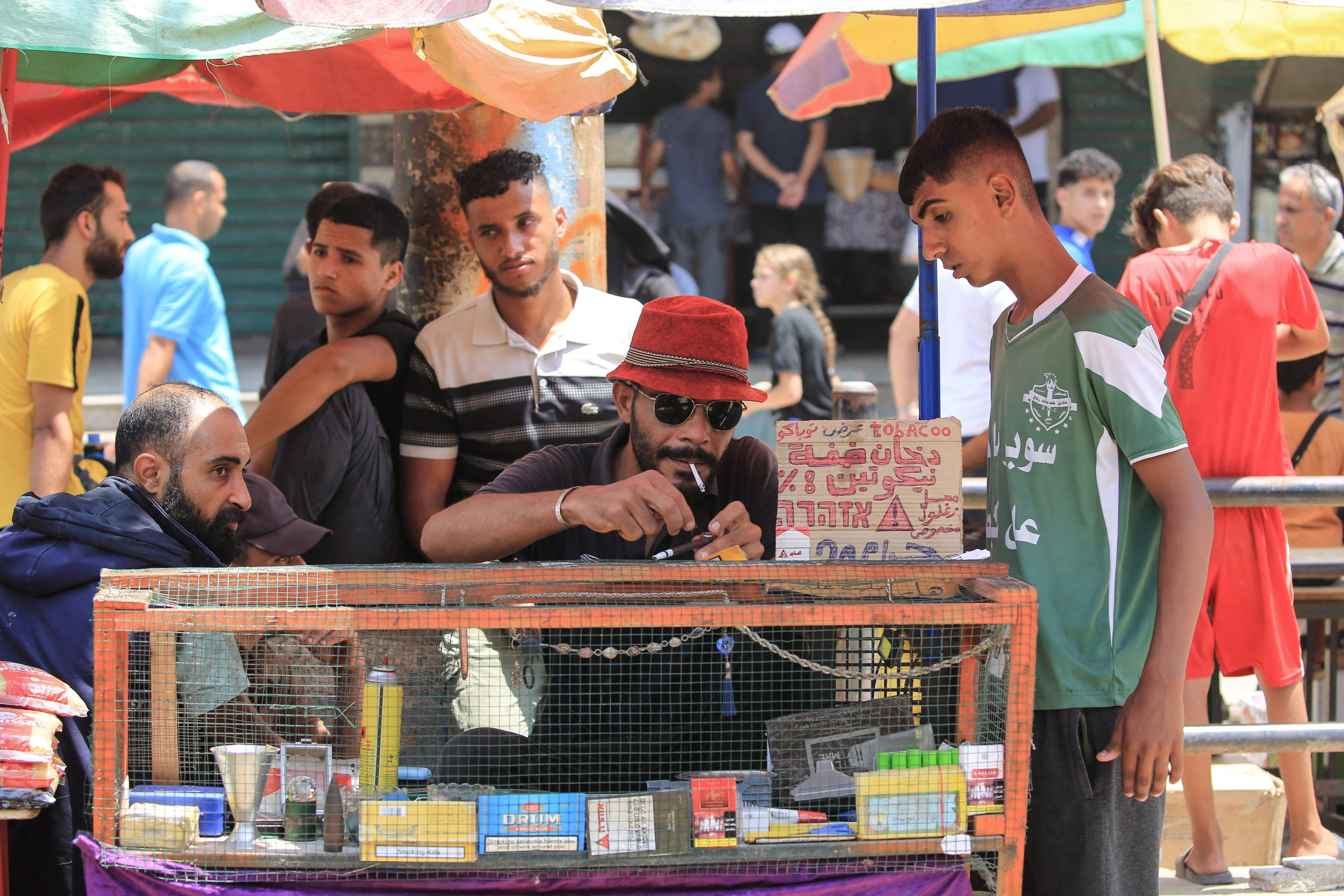 Puffs of gold: Sharing a $30 cigarette in wartime Gaza