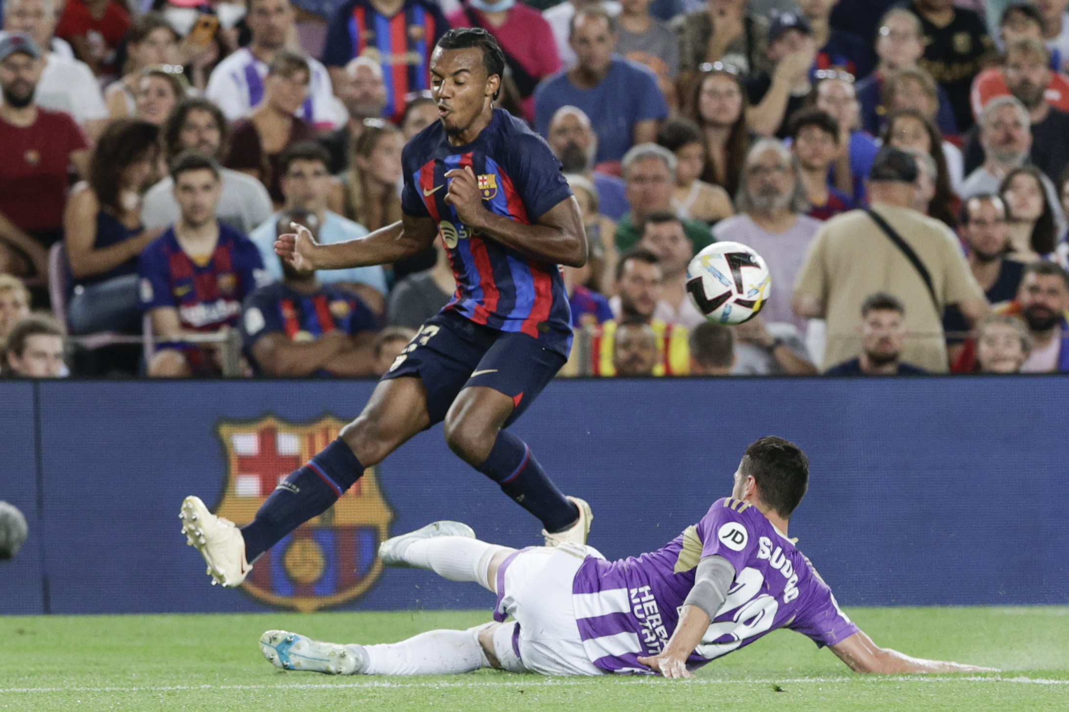 Jules Kounde challenges for the ball against Real Valladolid defender Sergio Escudero. EPA
