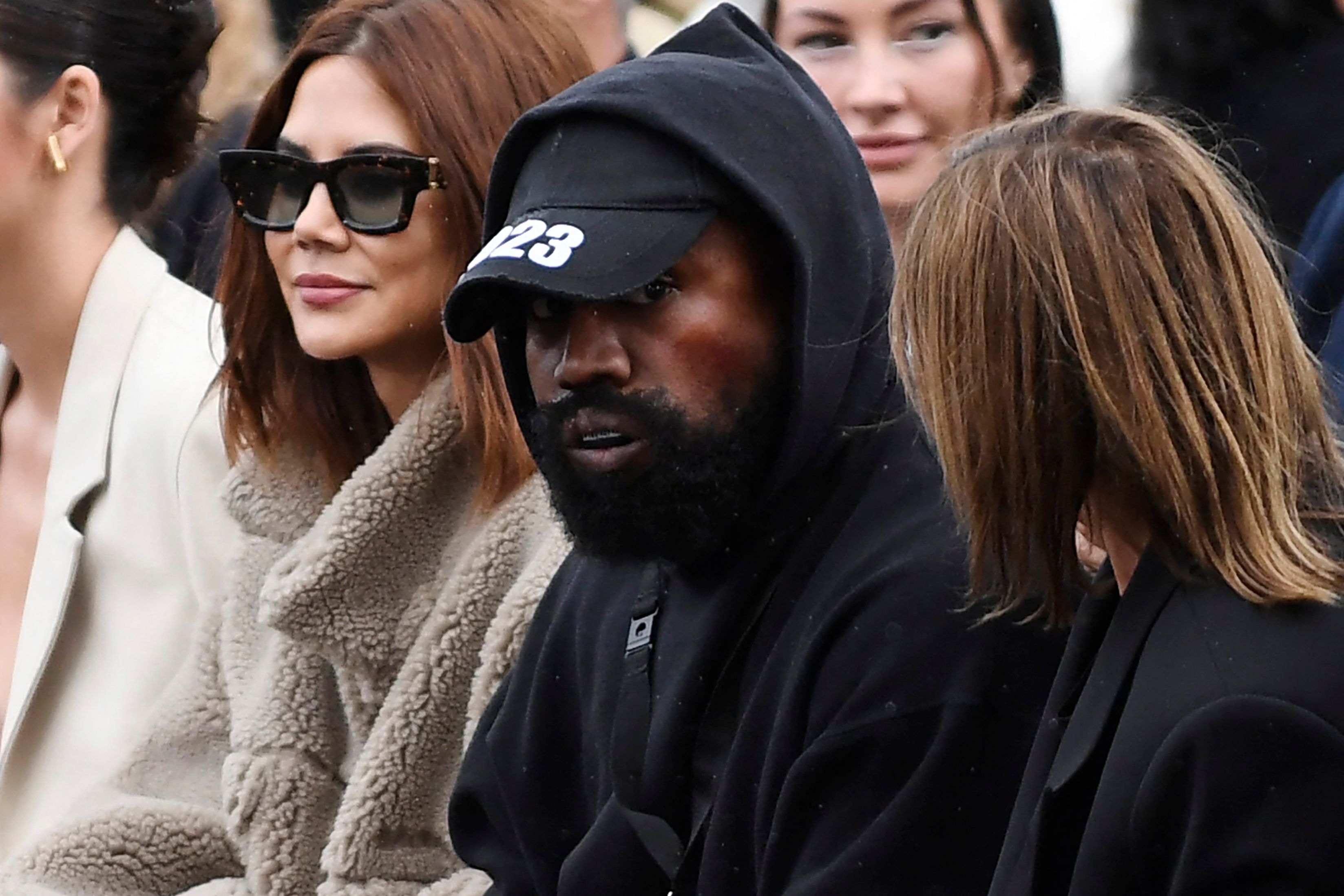 Kanye West spotted with Louis Vuitton suitcase and tote despite his boycott
