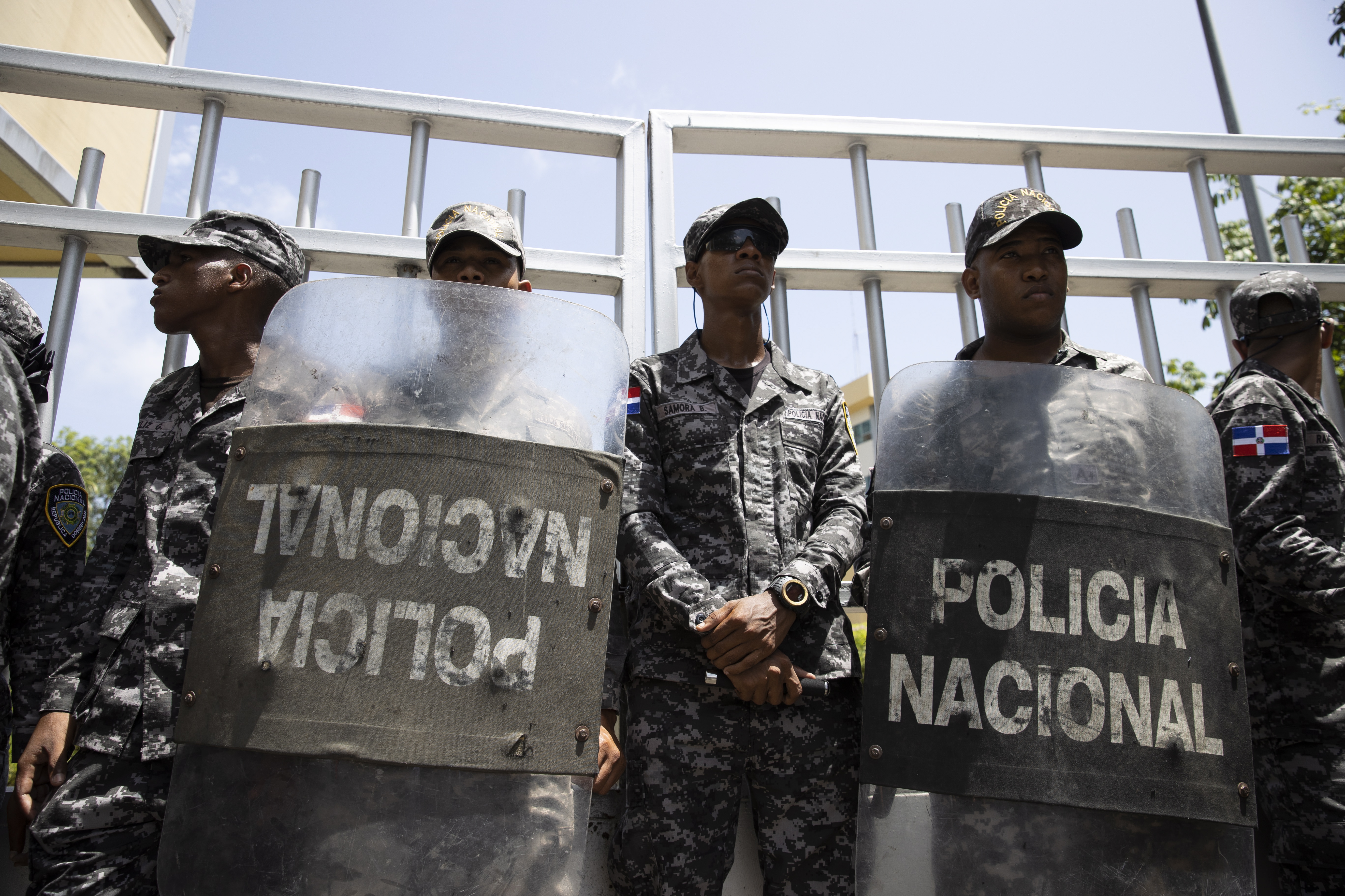 Police prevented mourners gathered near the offices from entering. EPA