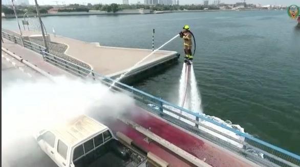 Dubai launches Dolphin water jetpack system for firefighting from the air -  ABC News