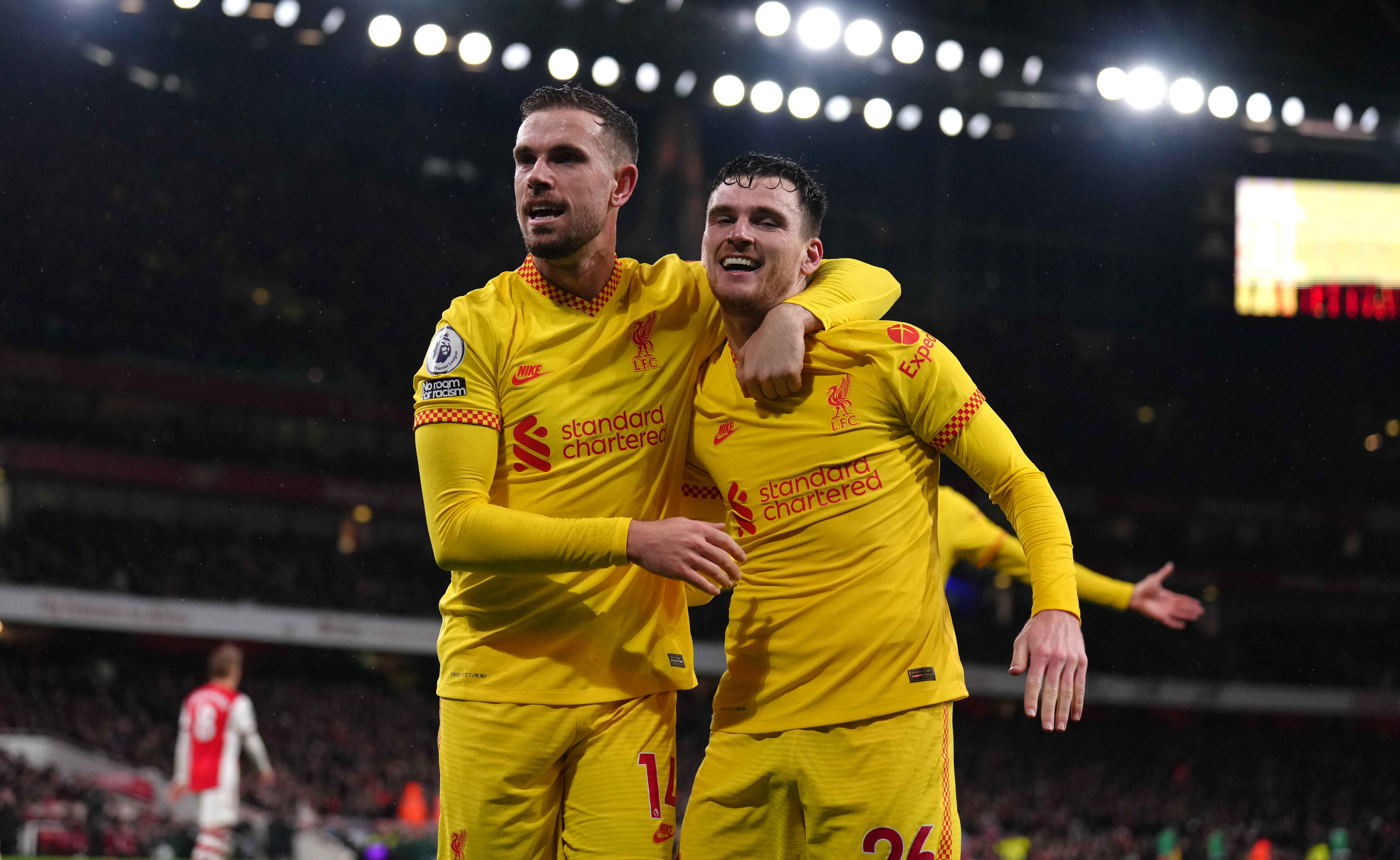 Jordan Henderson and Andrew Robertson celebrate. PA