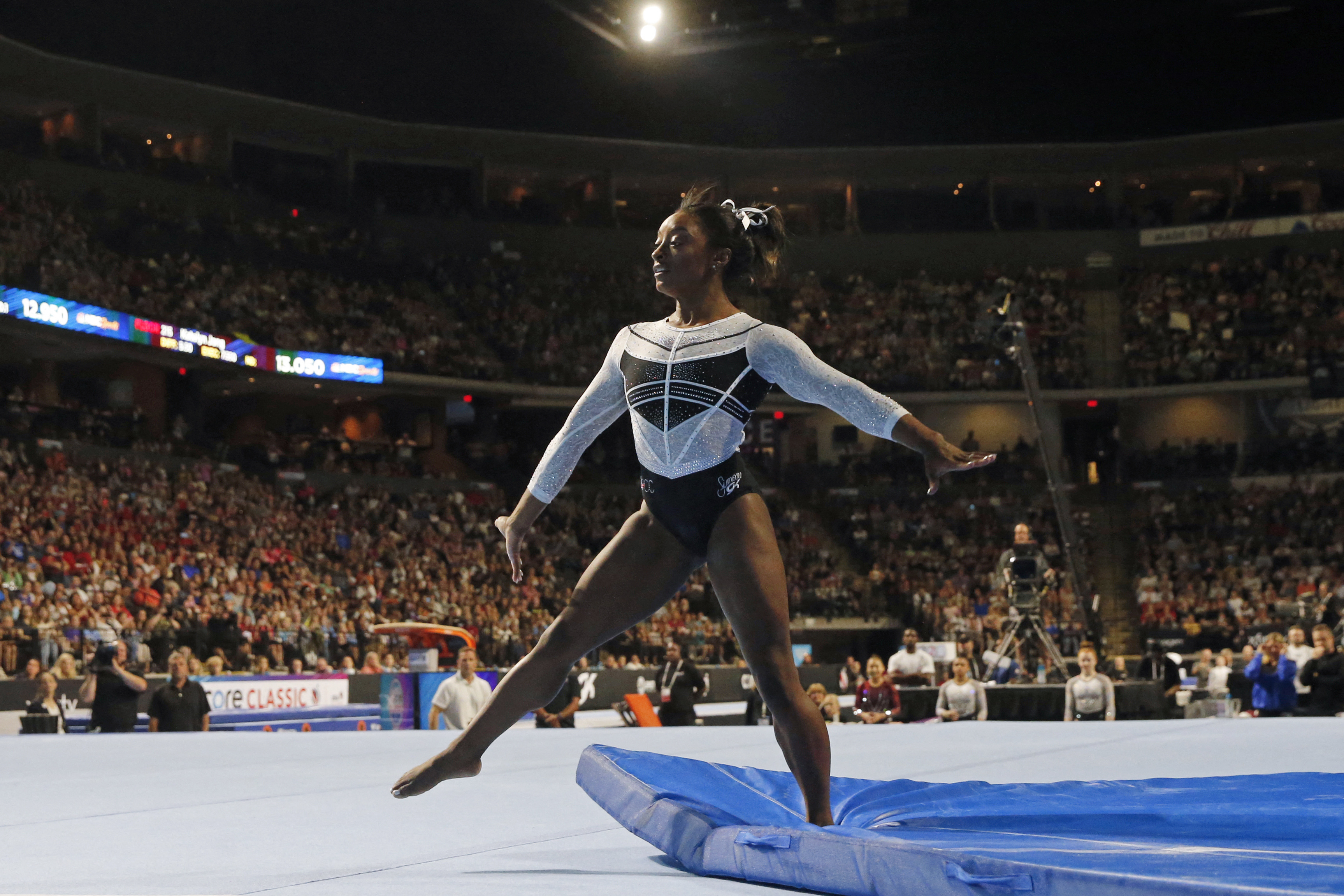 Simone Biles wins 20th world title as US women seal team gold