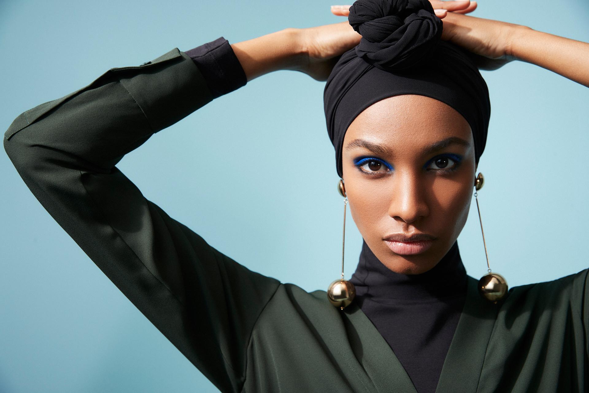 Burberry unveils Ikram Abdi Omar as first hijab-clad model to star in  festive campaign