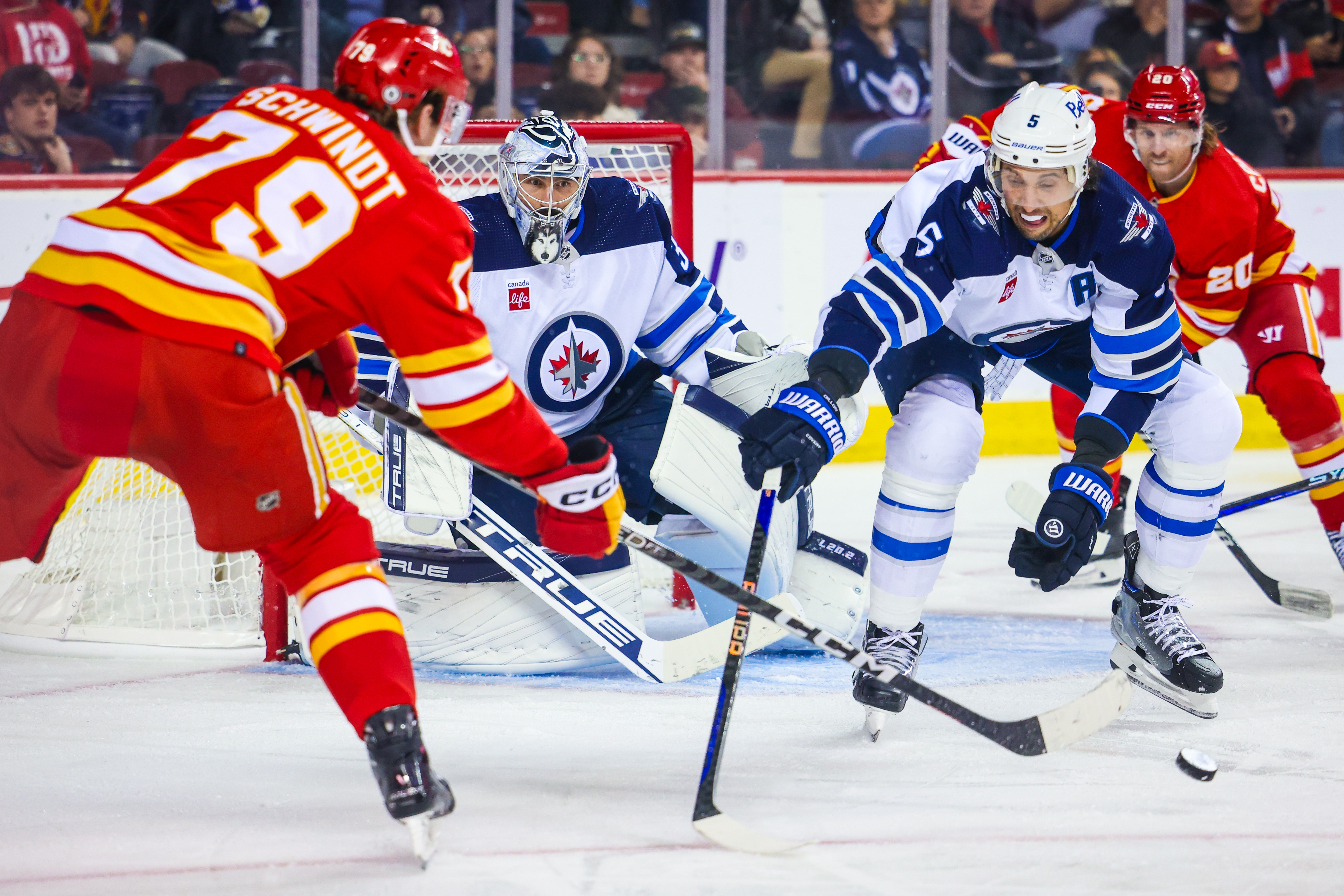 Winnipeg Jets preseason vs. Calgary Flames tonight, Connor Hellebuyck  starts in goal 